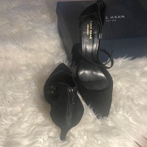 Black suede 3” heels. Zipper back and criss cross top with pointed toe.